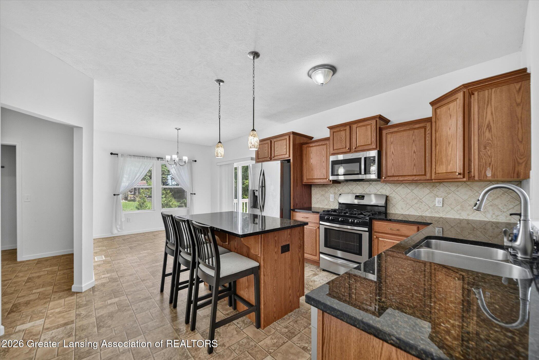47 Lake Ridge Drive Mason, MI 48854 - Photo 11 of 53 11-47-Lake-Ridge-Dr-Windowstill