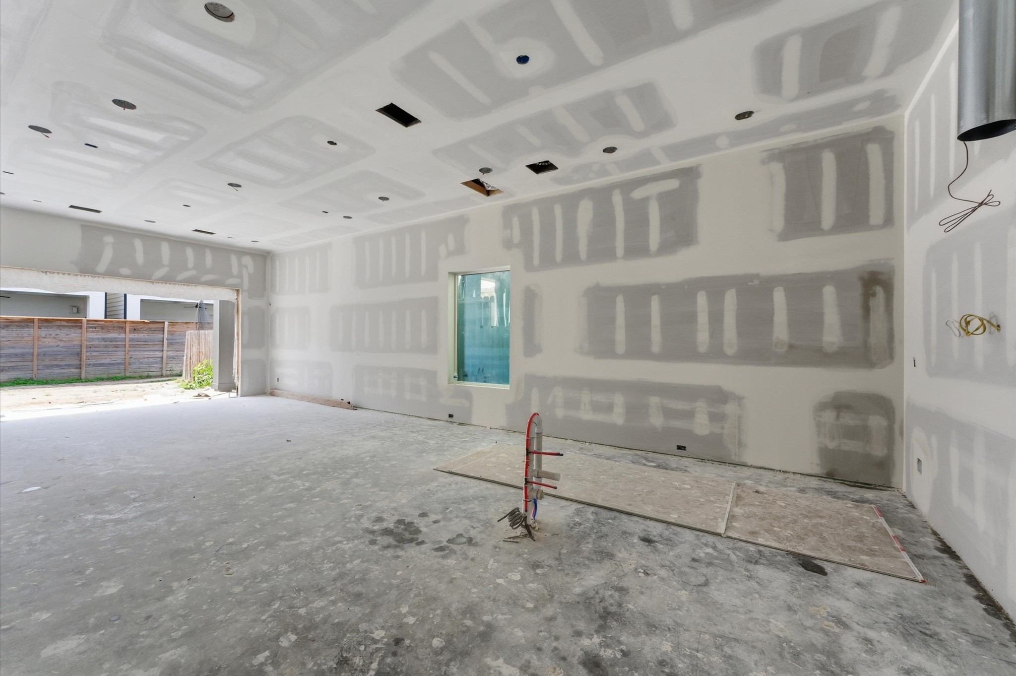 112 East 27th Street Houston, TX 77008 - Photo 10 of 43 The kitchen and living area offer plenty of natural light.