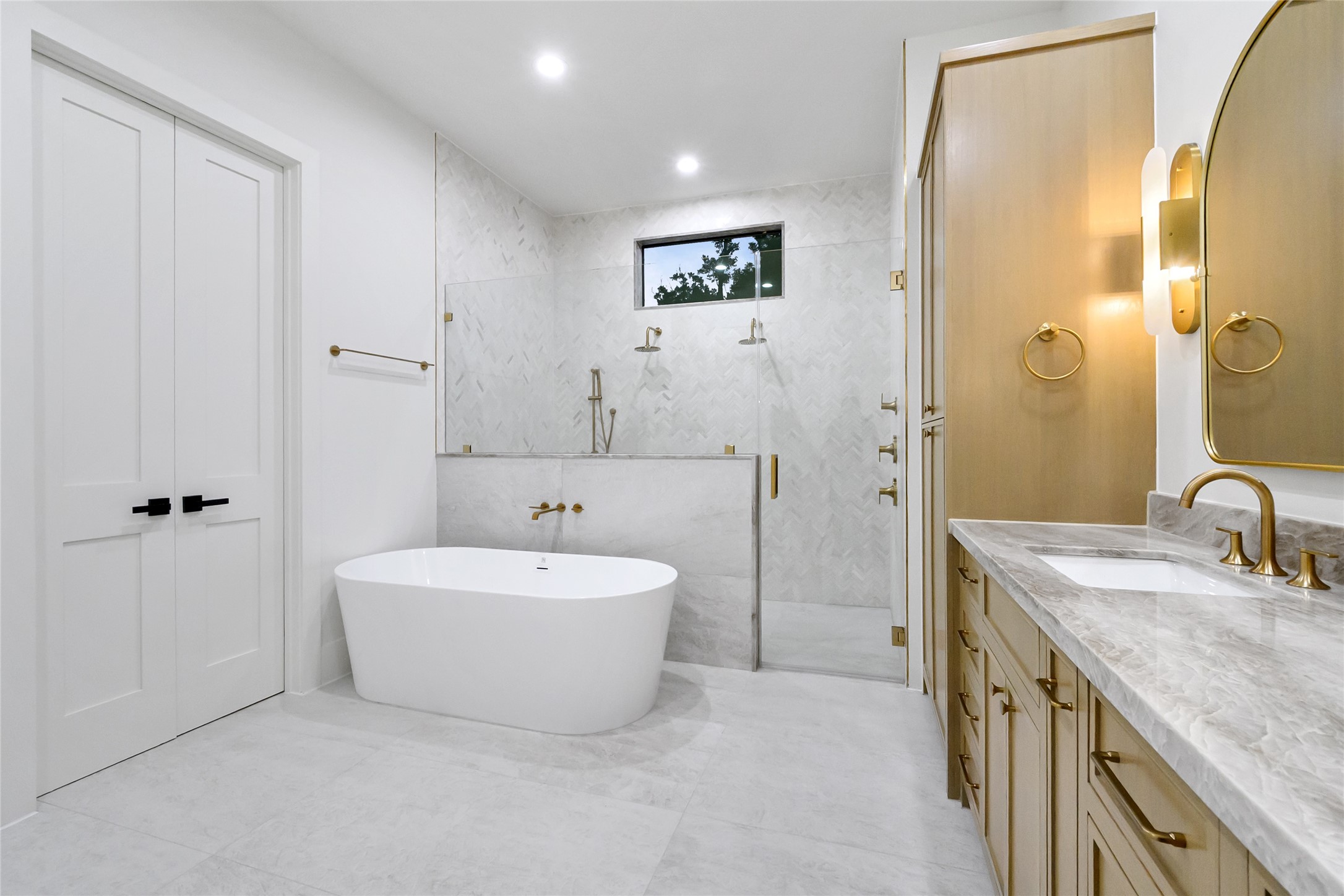 112 East 27th Street Houston, TX 77008 - Photo 35 of 43 a spacious bathroom with a double vanity sink mirror and double