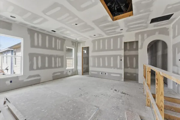 a bathroom with bathtub and shower