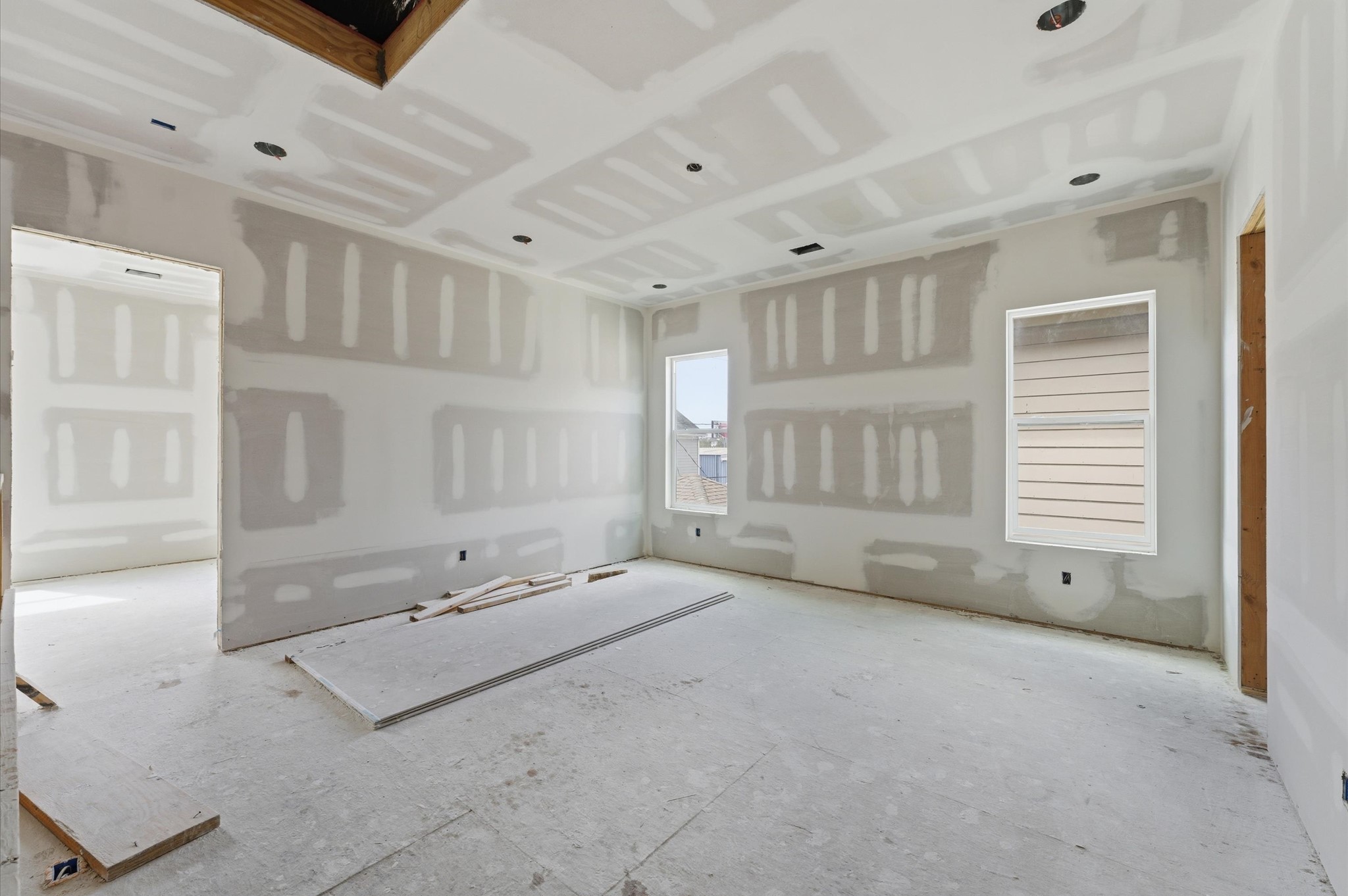 112 East 27th Street Houston, TX 77008 - Photo 18 of 43 a view of an empty room with kitchen and window