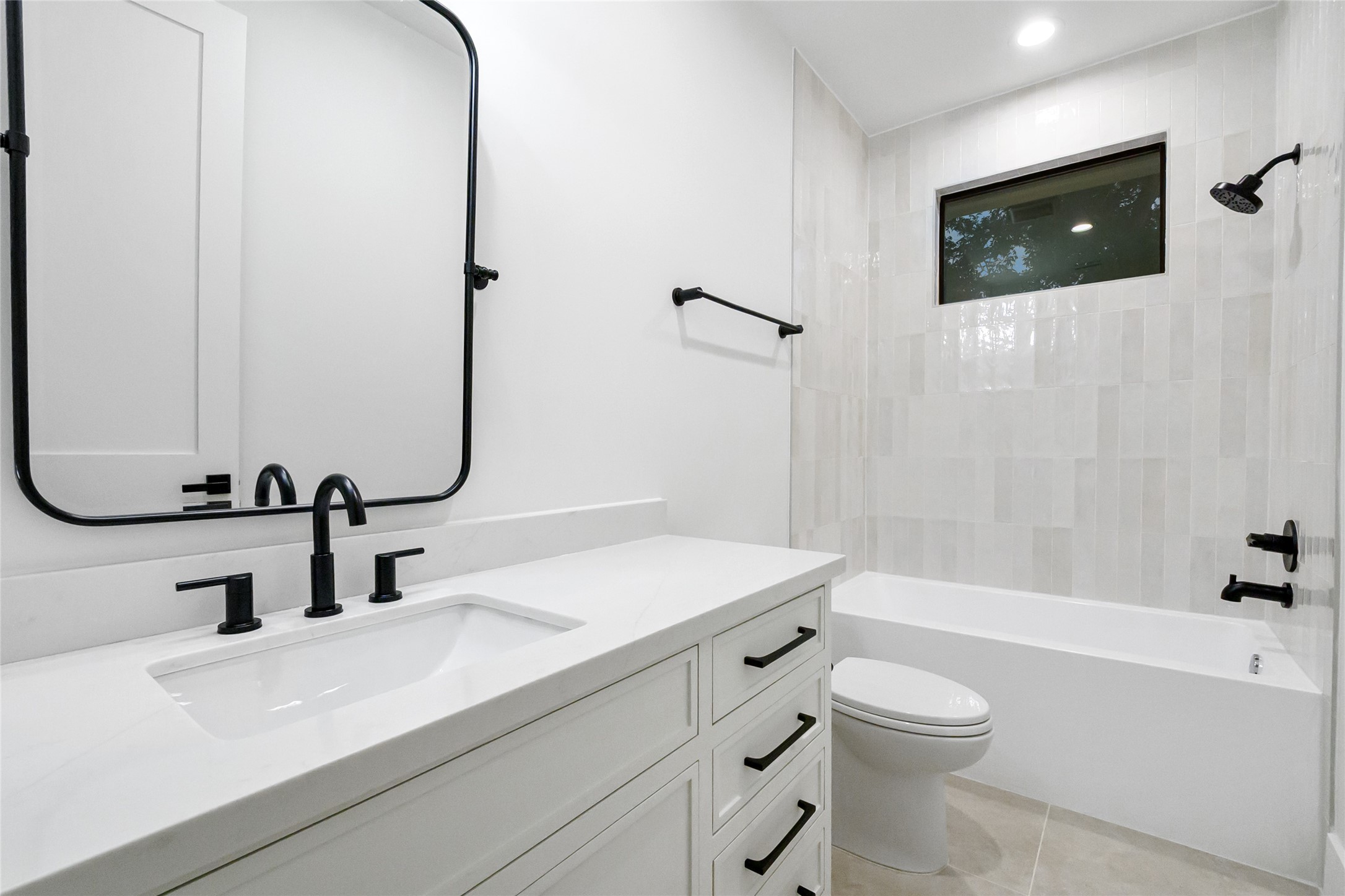 112 East 27th Street Houston, TX 77008 - Photo 43 of 43 a bathroom with a sink a toilet and shower