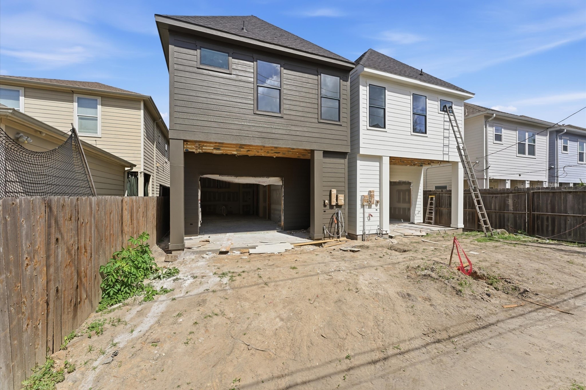 112 East 27th Street Houston, TX 77008 - Photo 3 of 43 a front view of a house with a yard and garage