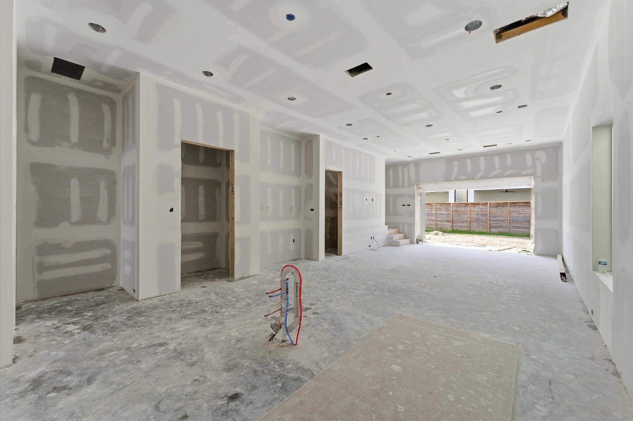 112 East 27th Street Houston, TX 77008 - Photo 8 of 43 The spacious living area includes a dry bar and a covered patio.