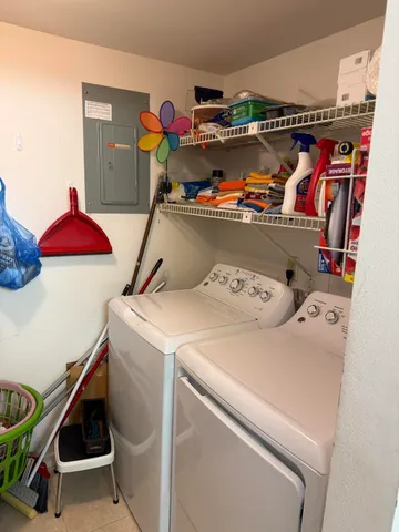 a utility room with dryer and washer