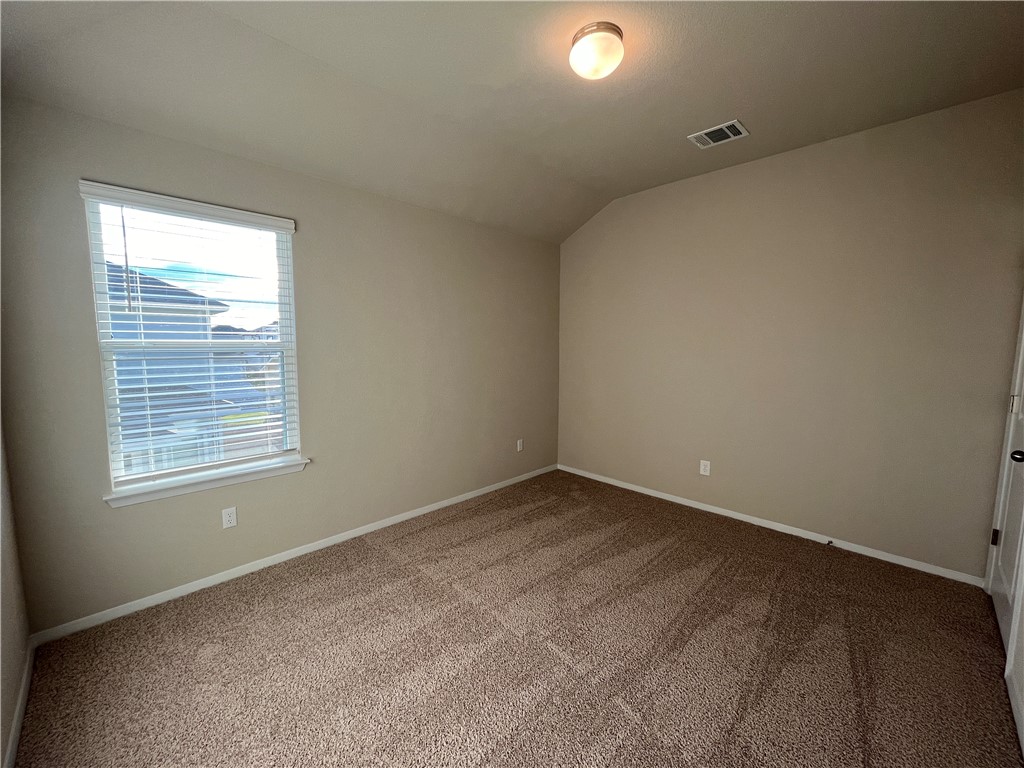 128 Bright Flora Lane Maxwell, TX 78656 - Photo 12 of 14 an empty room with a window