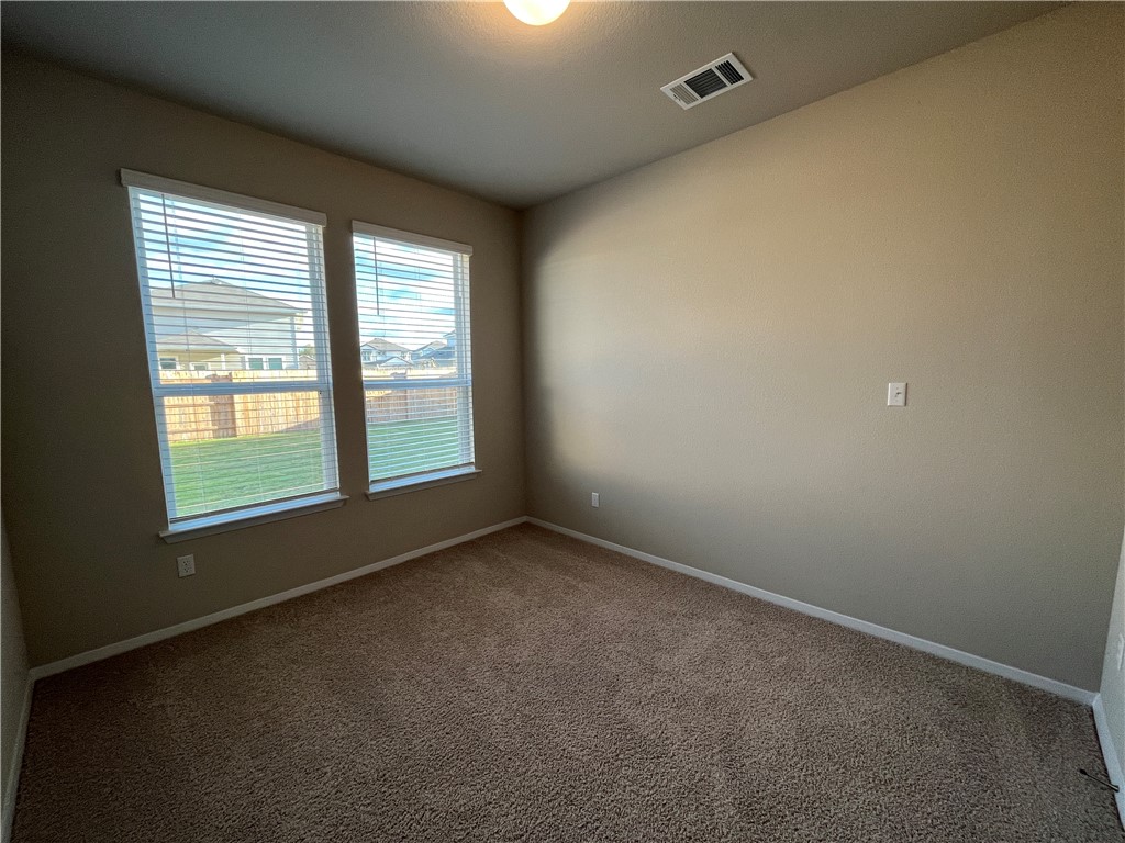 128 Bright Flora Lane Maxwell, TX 78656 - Photo 6 of 14 an empty room with a window