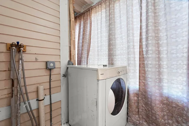 a bathroom with shower and bathtub