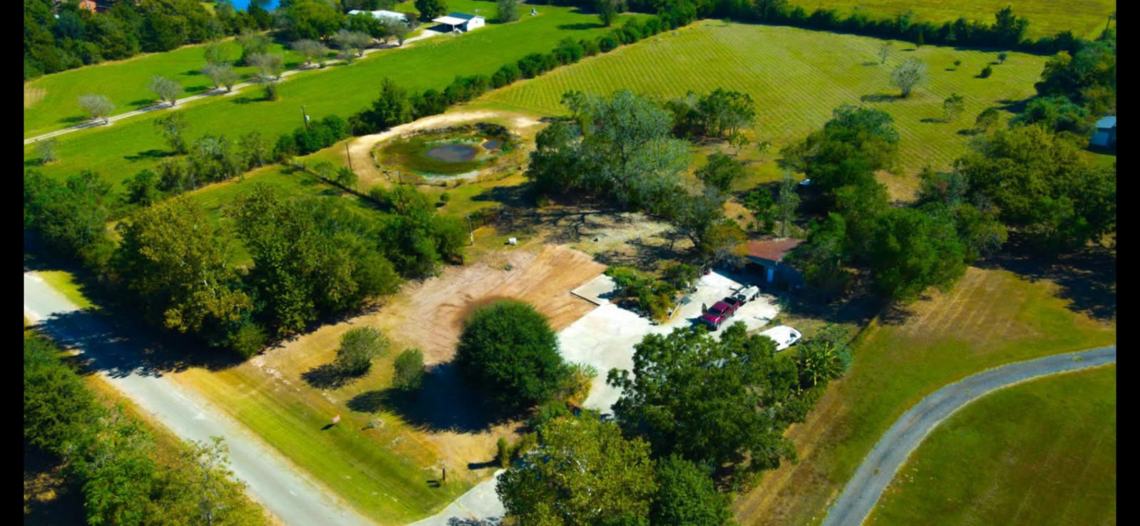 18106 Domino Road Waller, TX 77484 - Photo 13 of 16 a view of a lake with a yard