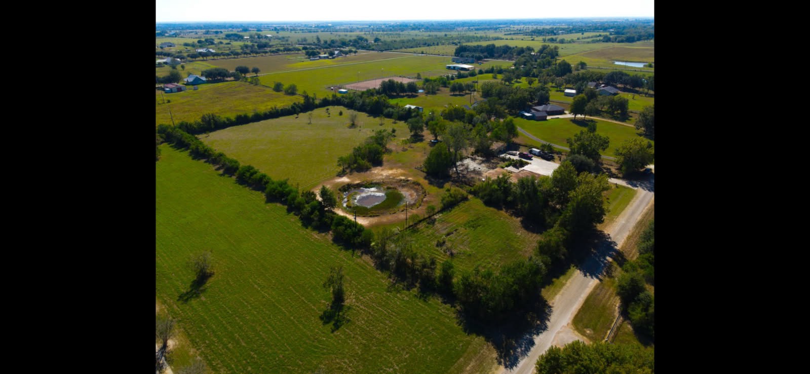 18106 Domino Road Waller, TX 77484 - Photo 2 of 16 a view of a lake from a balcony