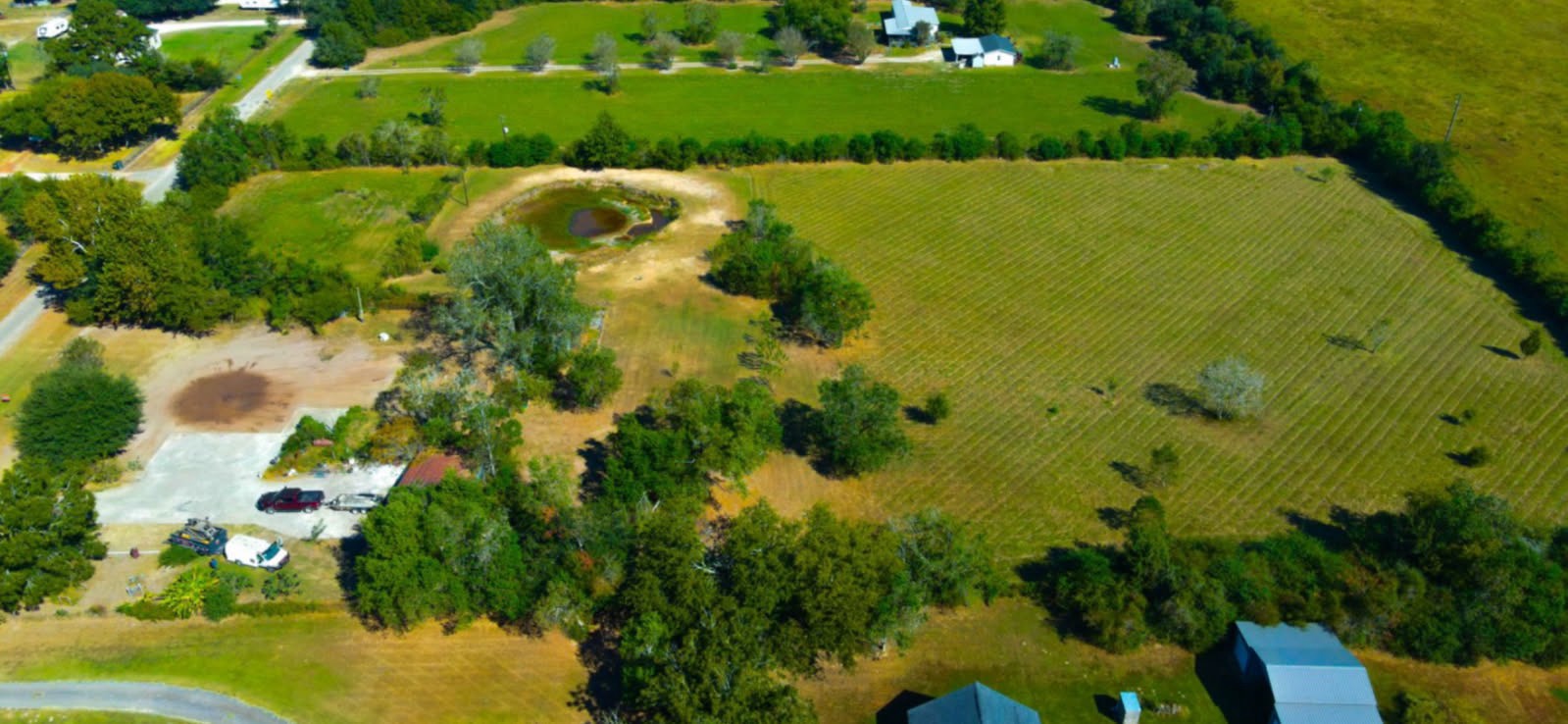 18106 Domino Road Waller, TX 77484 - Photo 10 of 16 a view of a lake with a yard