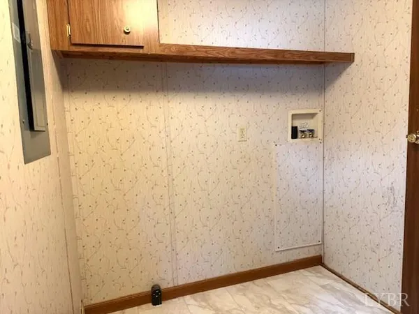 a view of a swimming pool with a yard