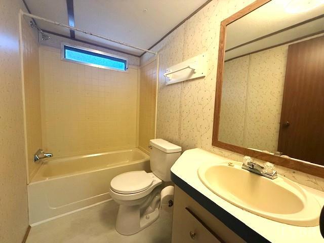 2041 Eureka Mill Road Keysville, VA 23947 - Photo 20 of 37 a bathroom with a sink toilet and shower