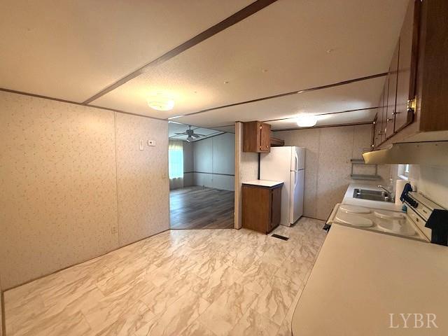 2041 Eureka Mill Road Keysville, VA 23947 - Photo 3 of 37 a room with a bed and a view of kitchen