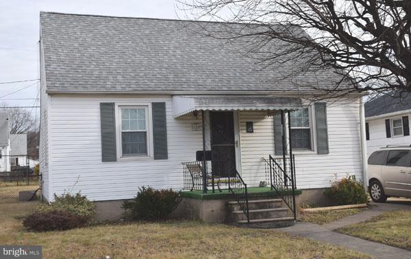 1533 Leslie Road Baltimore, MD 21222 - Photo 1 of 15 a front view of a house with stairs