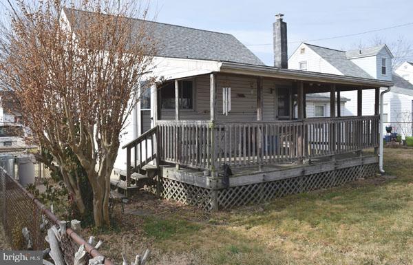 1533 Leslie Road Baltimore, MD 21222 - Photo 3 of 15 a view of a house with a wooden deck