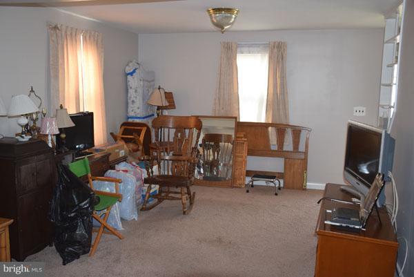 1533 Leslie Road Baltimore, MD 21222 - Photo 5 of 15 a view of a room with workspace and a window