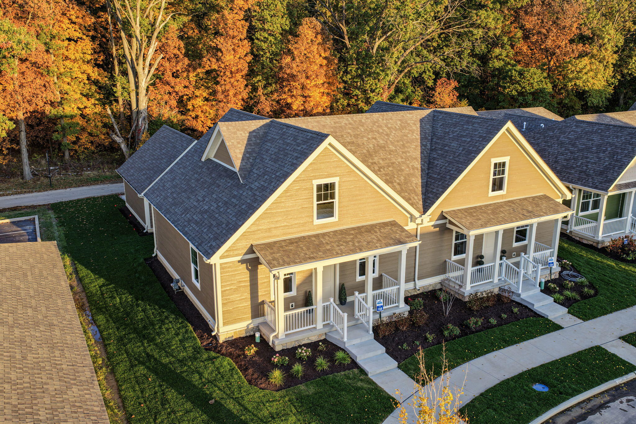1183 Harbor Way Chesterton, IN 46304 - Photo 1 of 20 a aerial view of a house with yard and trees in the background
