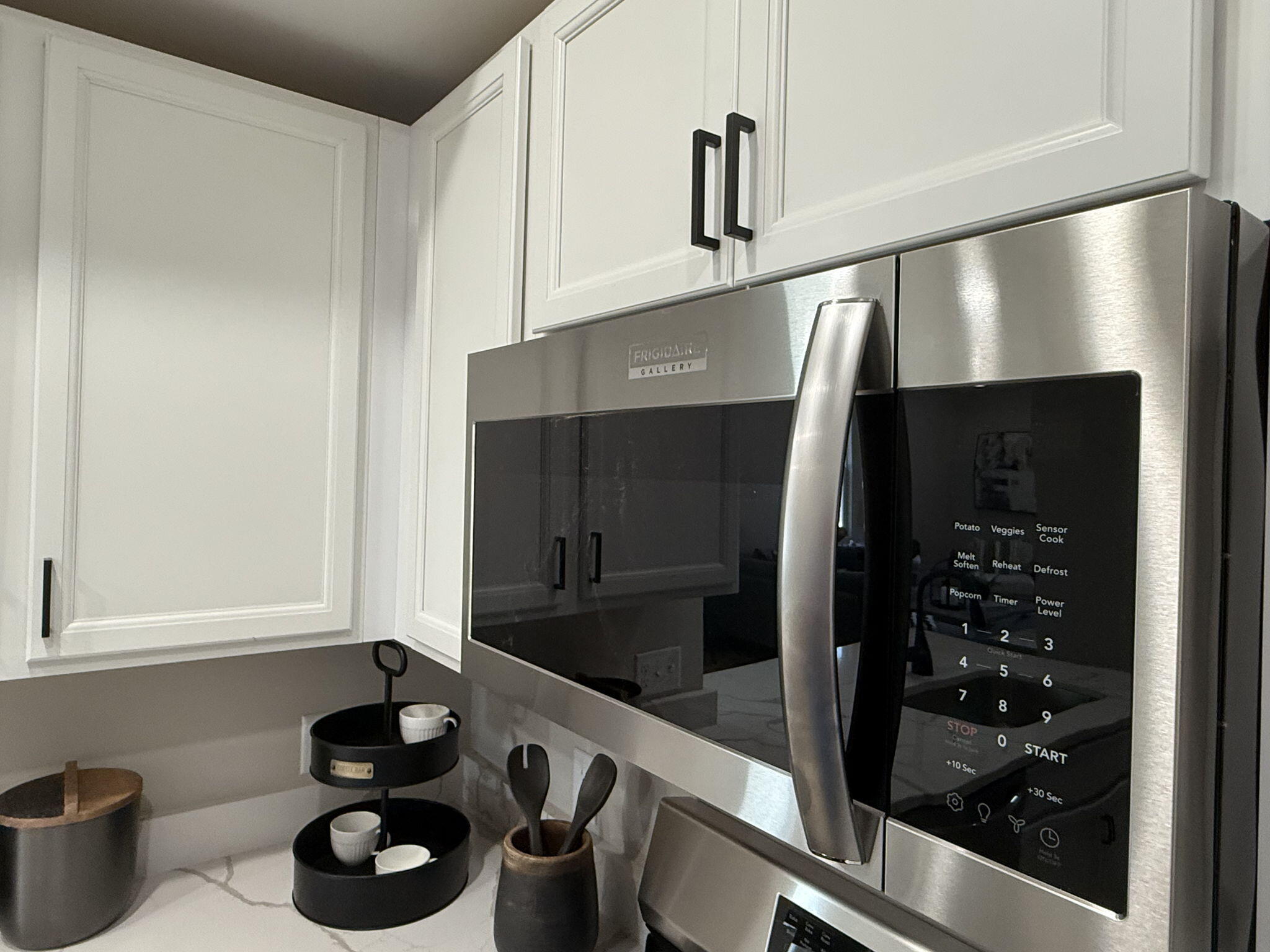 1183 Harbor Way Chesterton, IN 46304 - Photo 12 of 20 a kitchen with a refrigerator and a stove top oven