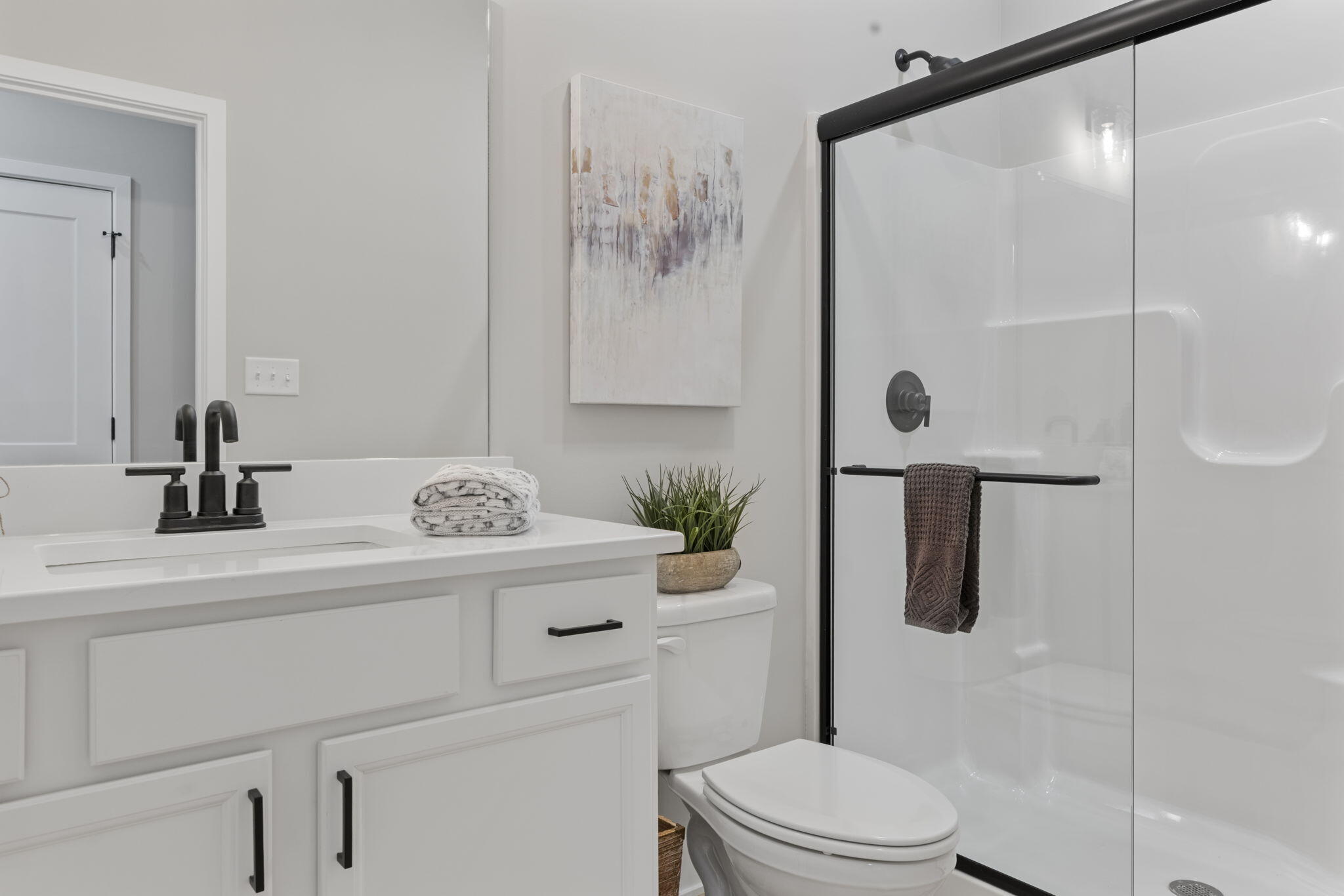 1183 Harbor Way Chesterton, IN 46304 - Photo 15 of 20 a bathroom with a sink a toilet and shower