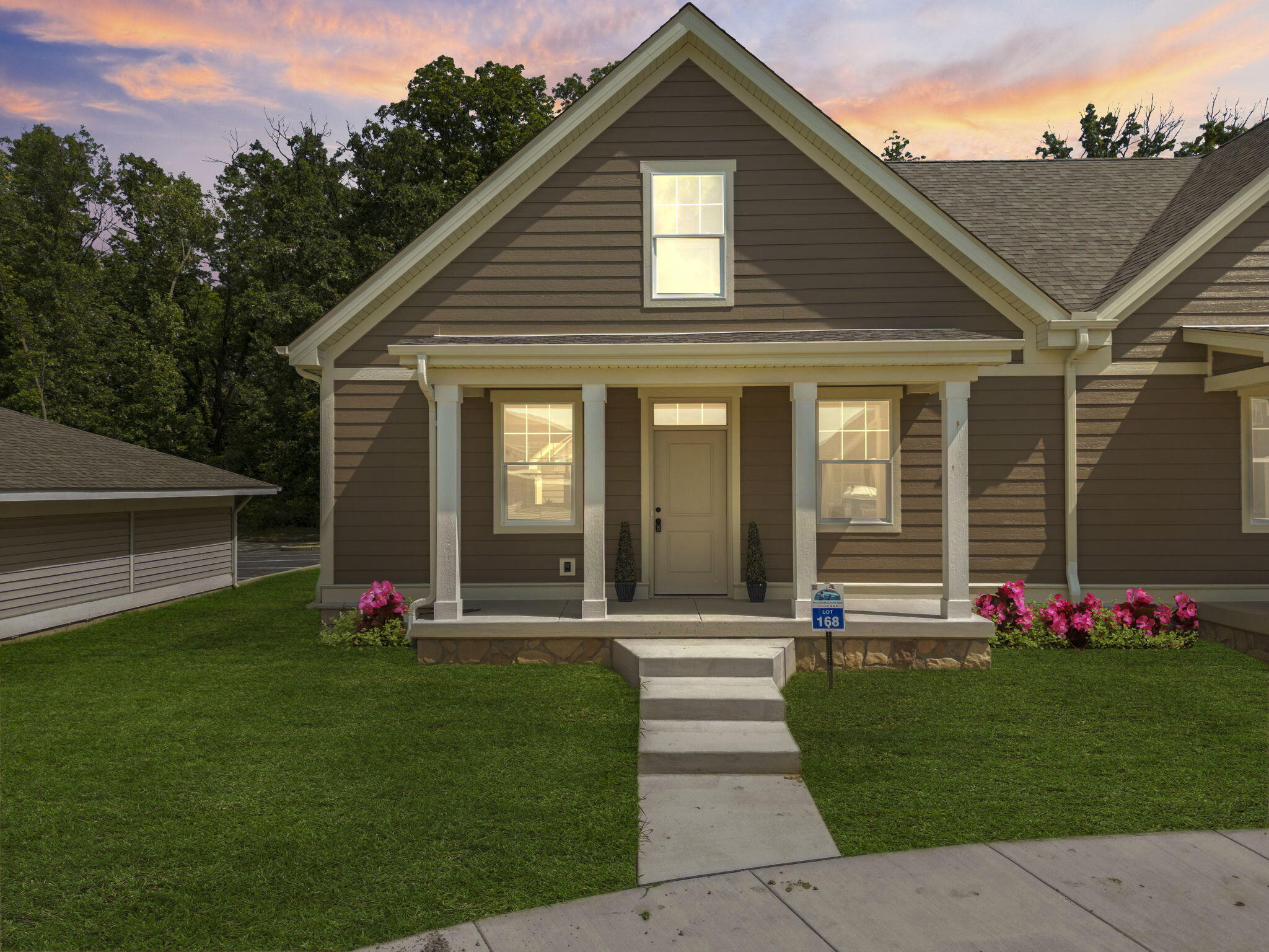 1183 Harbor Way Chesterton, IN 46304 - Photo 2 of 20 a front view of a house with a garden