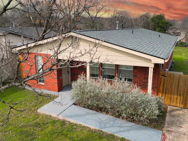 front view of house with a yard
