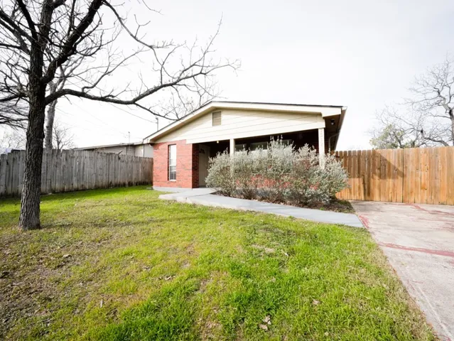 a front view of house with yard