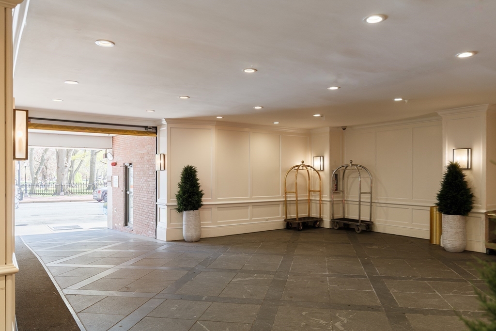2 Commonwealth Avenue, Unit 8G Boston, MA 02116 - Photo 13 of 20 a view of a livingroom with gym equipment