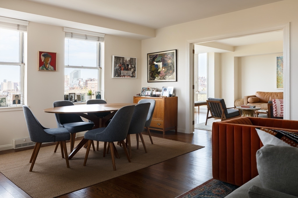 2 Commonwealth Avenue, Unit 8G Boston, MA 02116 - Photo 4 of 20 a dining room with furniture a window and wooden floor