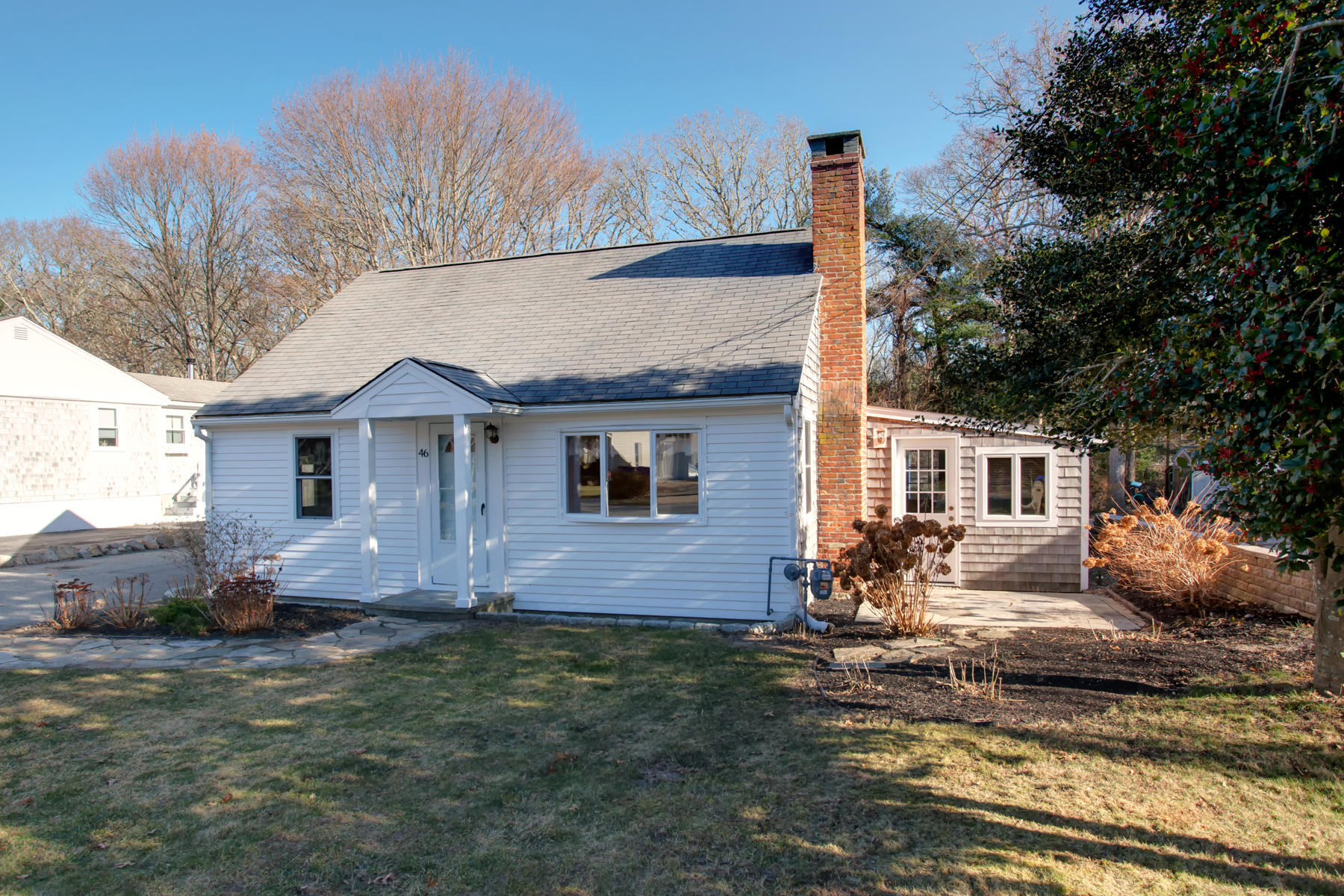 46 Thorne Road Bourne, MA 02532 - Photo 1 of 32 a front view of a house with a yard