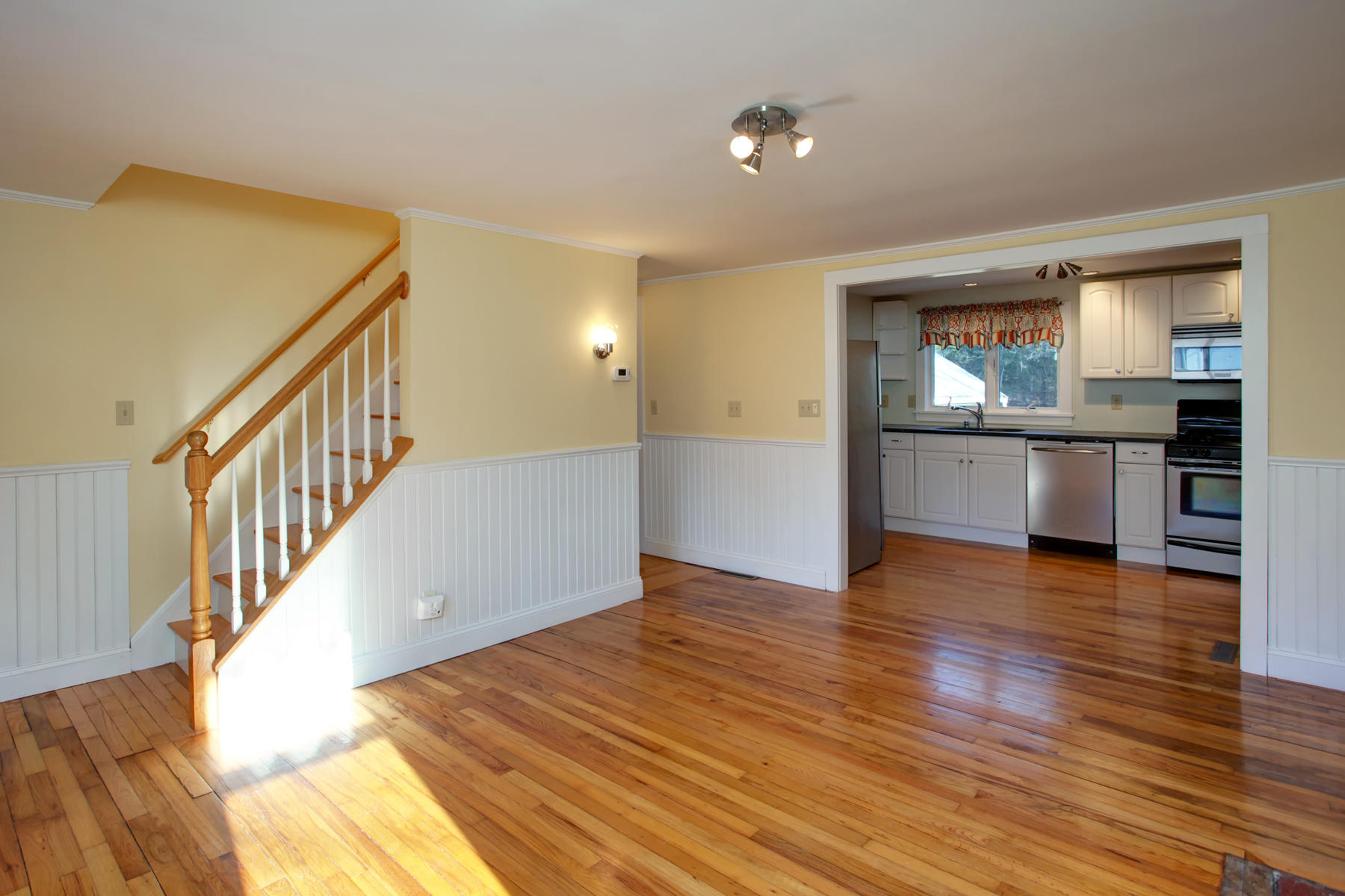 46 Thorne Road Bourne, MA 02532 - Photo 15 of 32 a view of a room with wooden floor and staircase