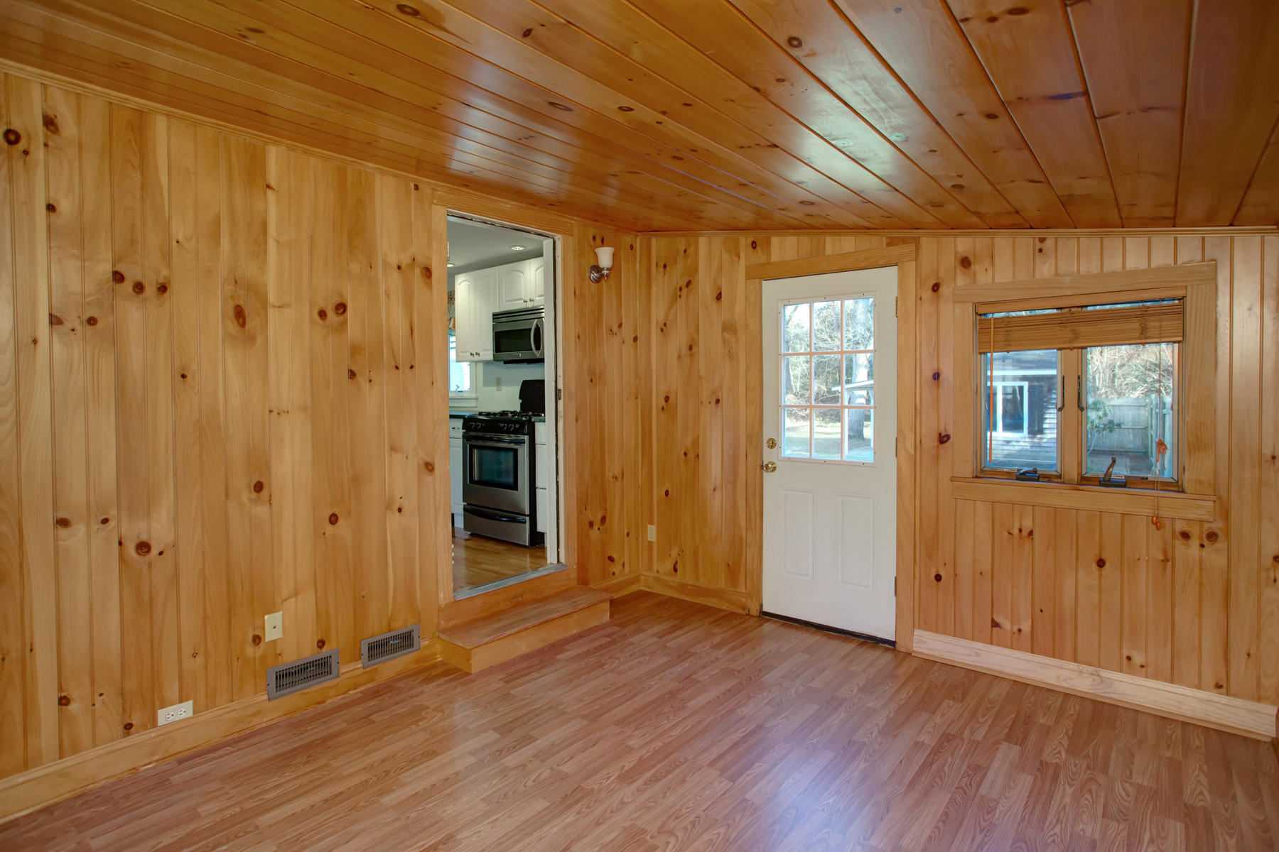 46 Thorne Road Bourne, MA 02532 - Photo 28 of 32 a view of a hallway with wooden floor and windows