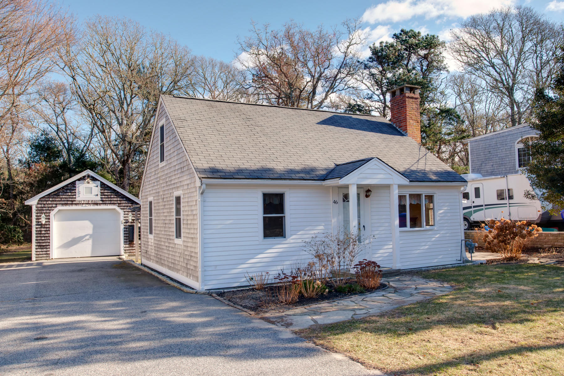 46 Thorne Road Bourne, MA 02532 - Photo 3 of 32 a front view of a house with a yard