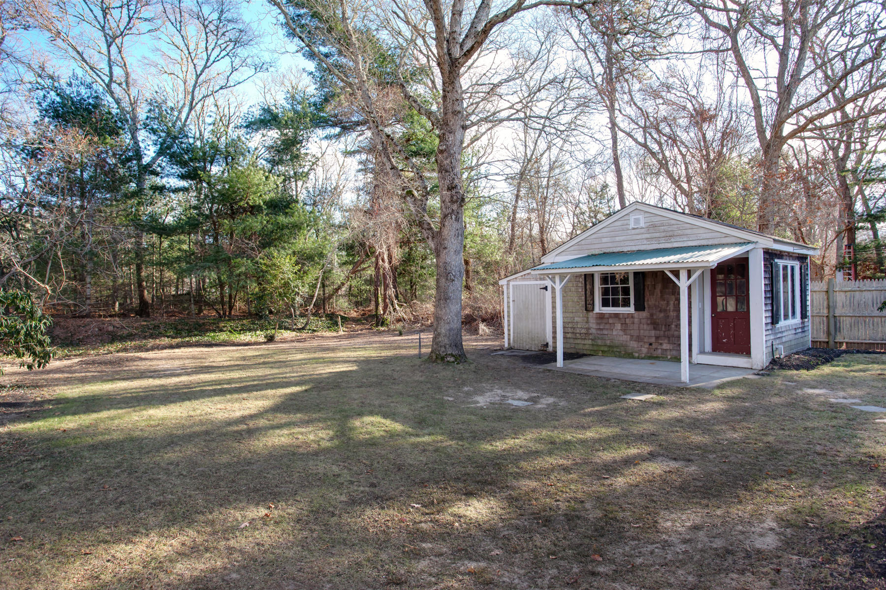 46 Thorne Road Bourne, MA 02532 - Photo 5 of 32 a front view of a house with a yard