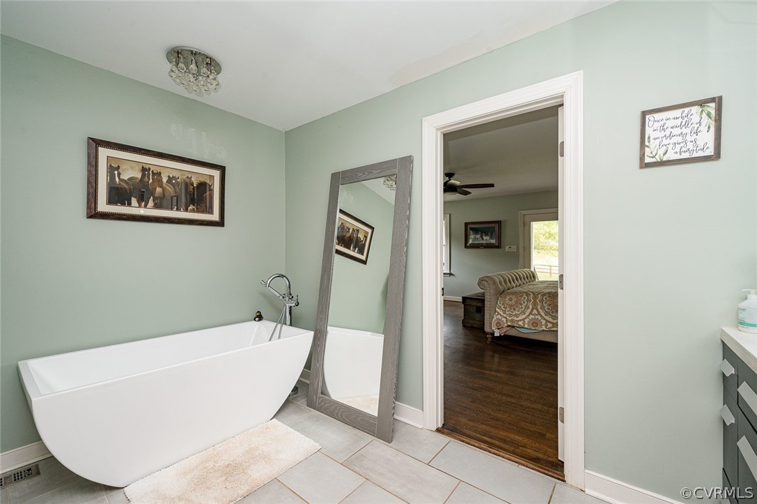 2114 Hawk Town Road Maidens, VA 23102 - Photo 23 of 50 a bathroom with a tub and shower