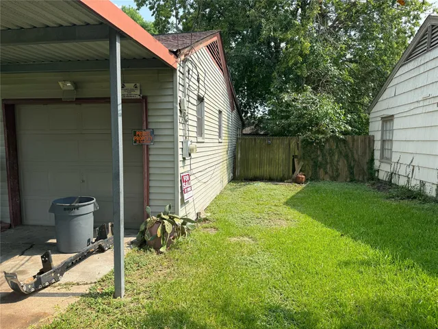 a backyard of a house with seating space