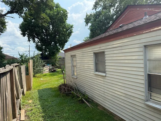 a view of a backyard with a garden