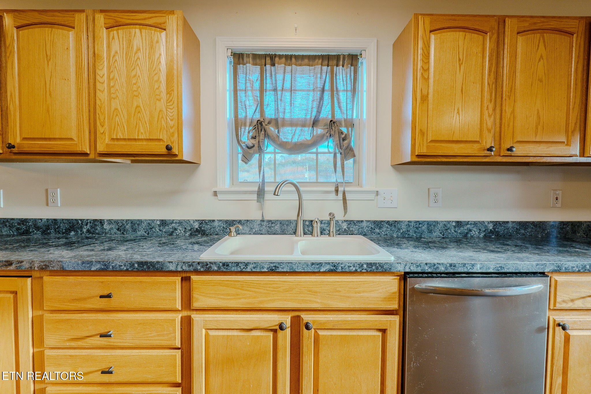6622 Carina Lane Corryton, TN 37721 - Photo 13 of 30 a kitchen with granite countertop cabinets and window