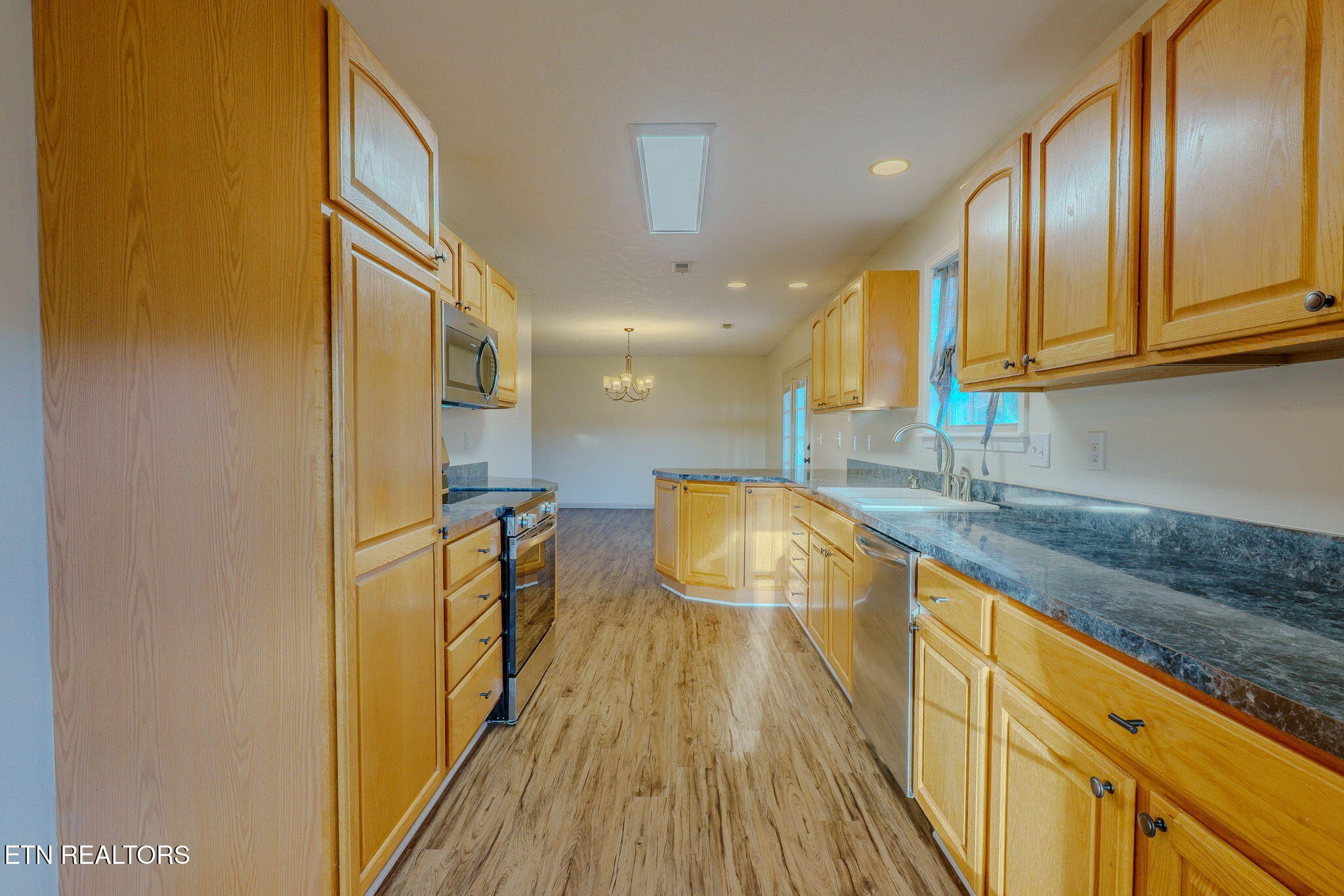 6622 Carina Lane Corryton, TN 37721 - Photo 14 of 30 a view of a kitchen with a sink and cabinets