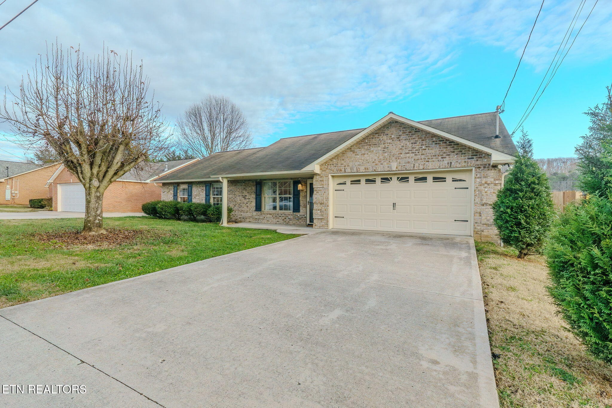 6622 Carina Lane Corryton, TN 37721 - Photo 2 of 30 a view of house with yard and garage