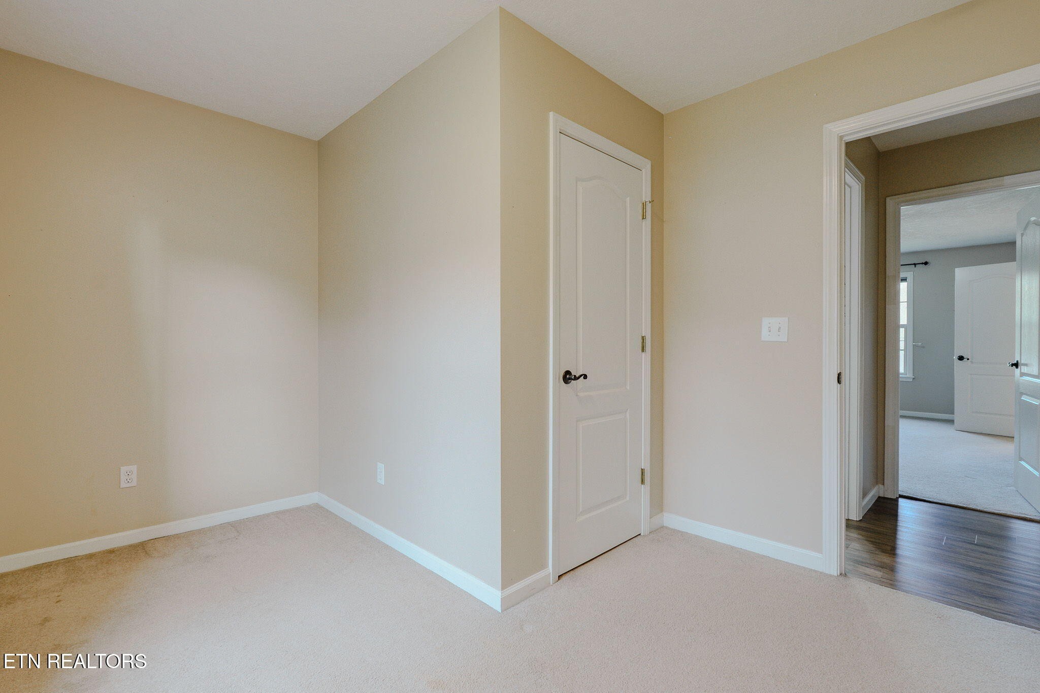 6622 Carina Lane Corryton, TN 37721 - Photo 26 of 30 a view of an empty room and wooden floor
