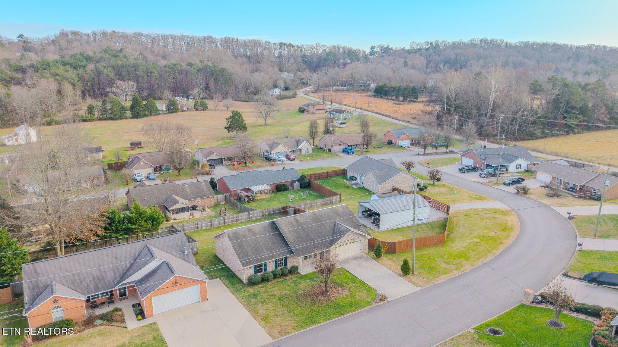 6622 Carina Lane Corryton, TN 37721 - Photo 29 of 30 an aerial view of a house with garden space and mountains