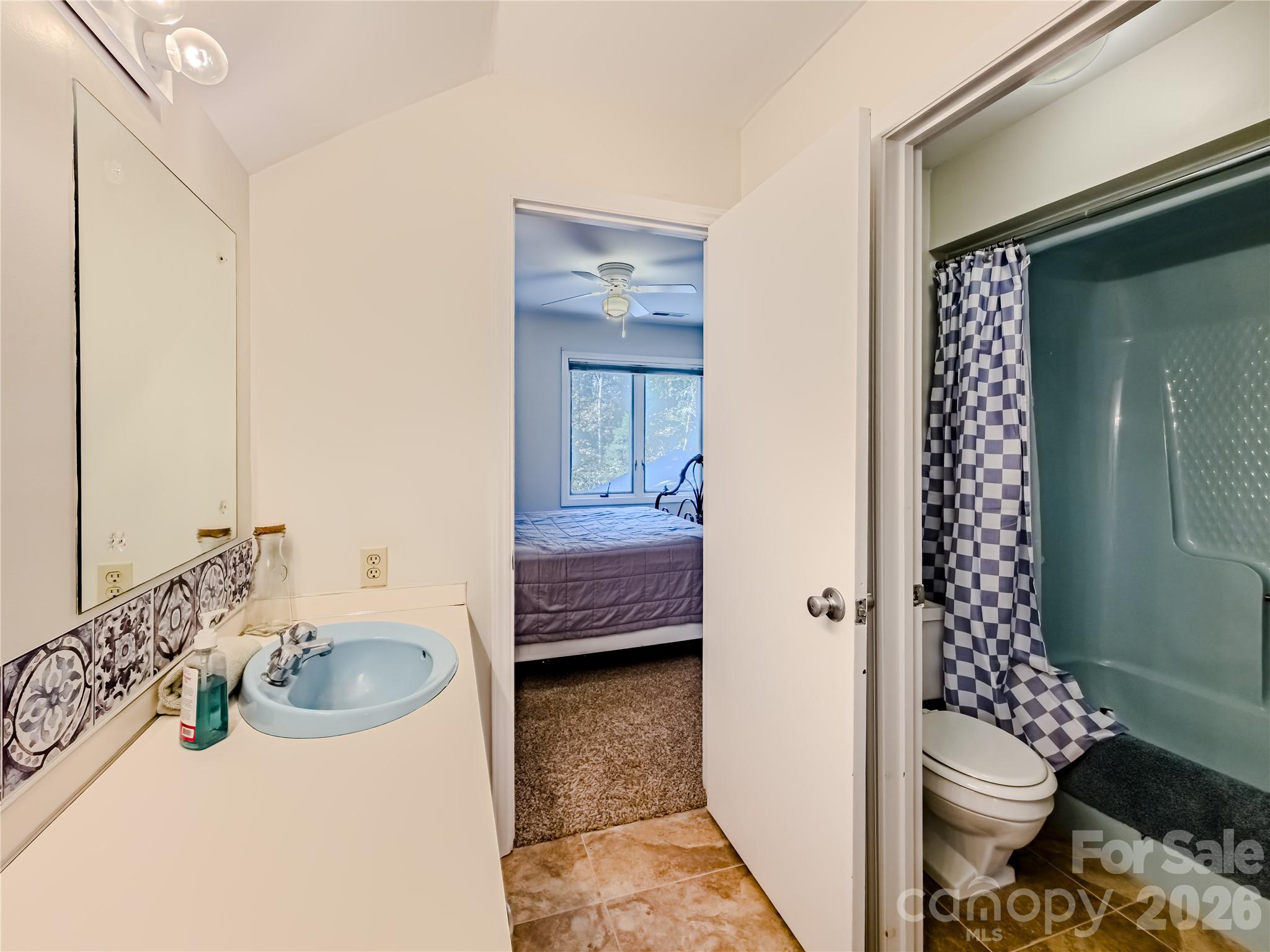 142 Padgett And Burns Road Forest City, NC 28043 - Photo 31 of 48 a bathroom with a sink toilet and shower
