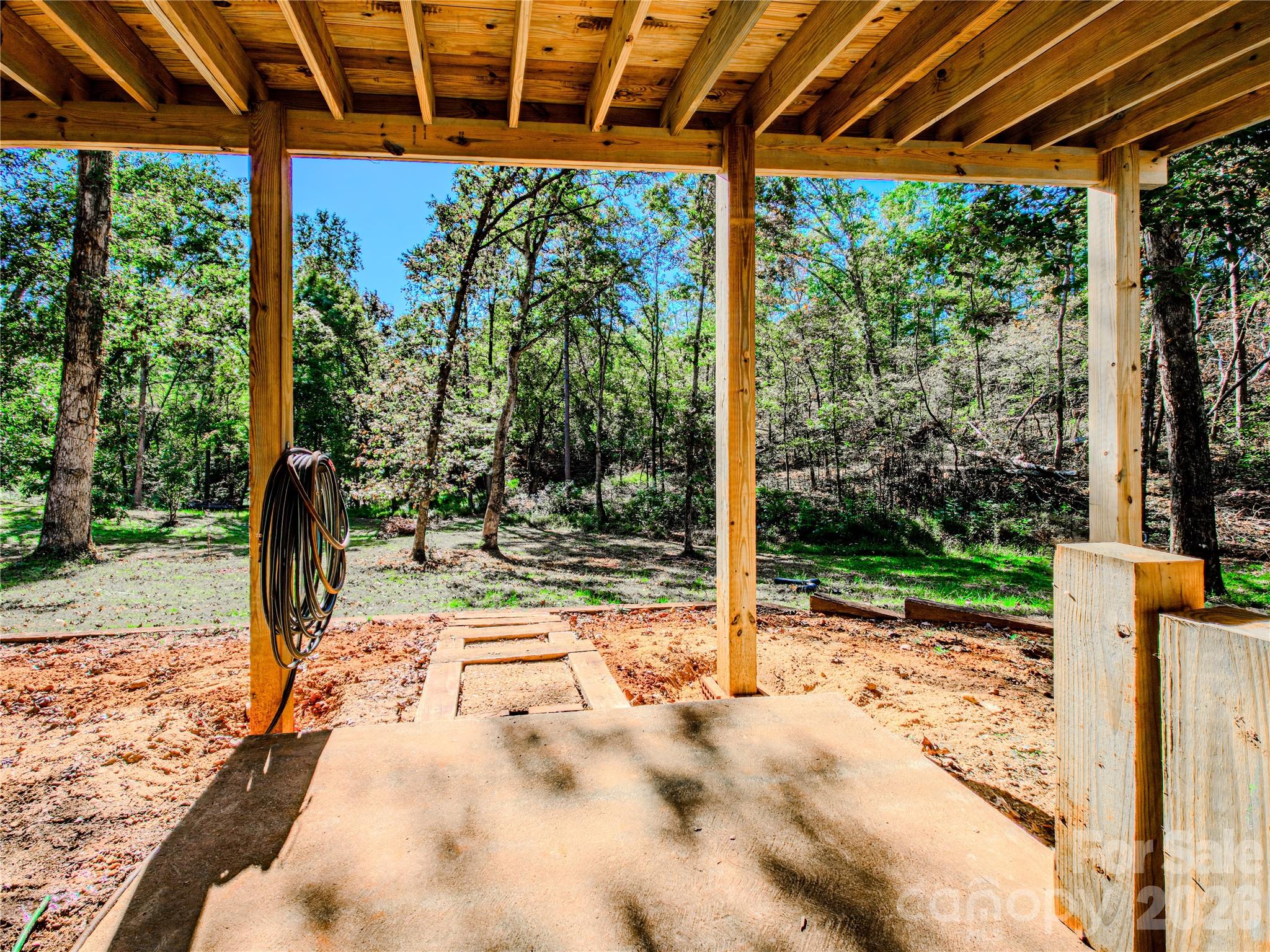 142 Padgett And Burns Road Forest City, NC 28043 - Photo 41 of 48 a view of a backyard with a small cabin