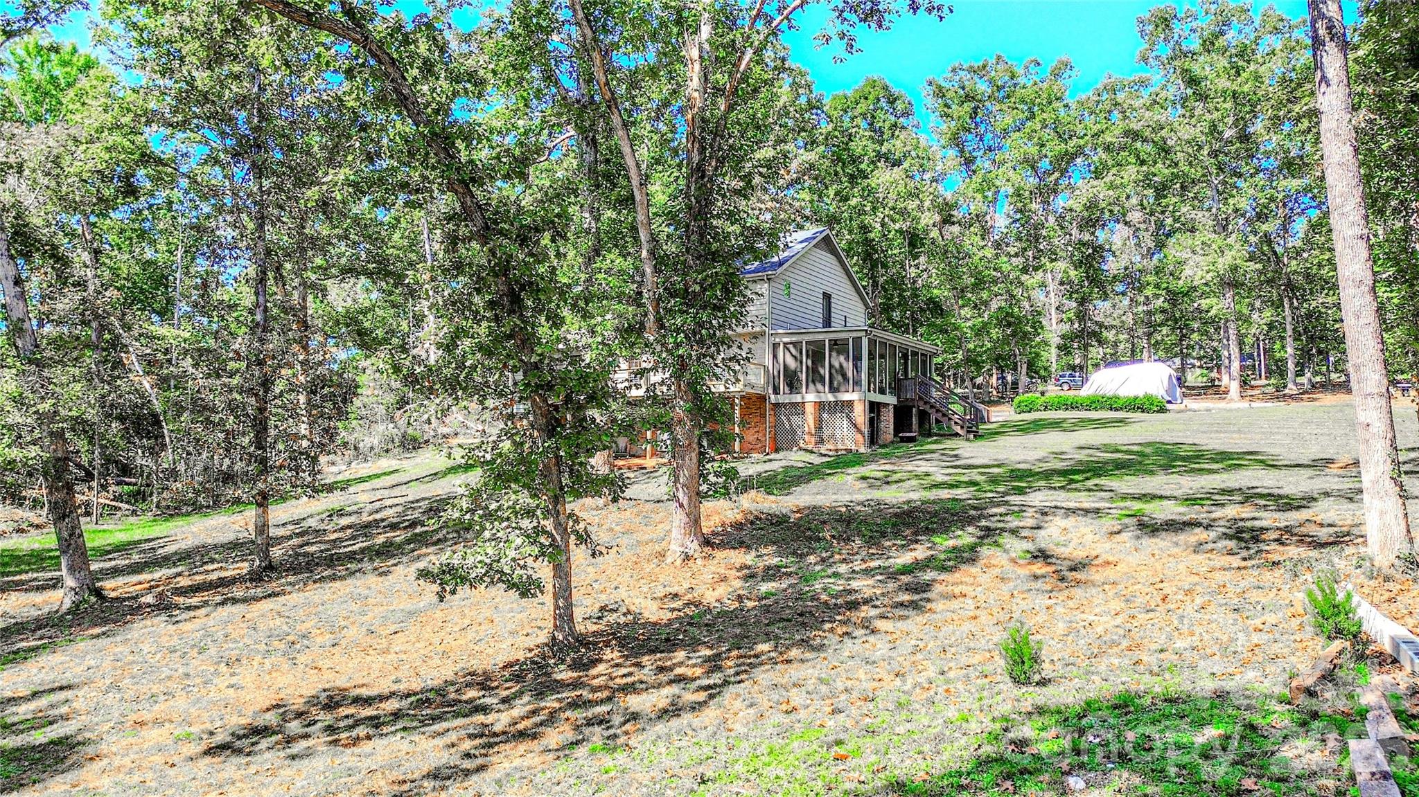 142 Padgett And Burns Road Forest City, NC 28043 - Photo 43 of 48 a view of a house with a yard
