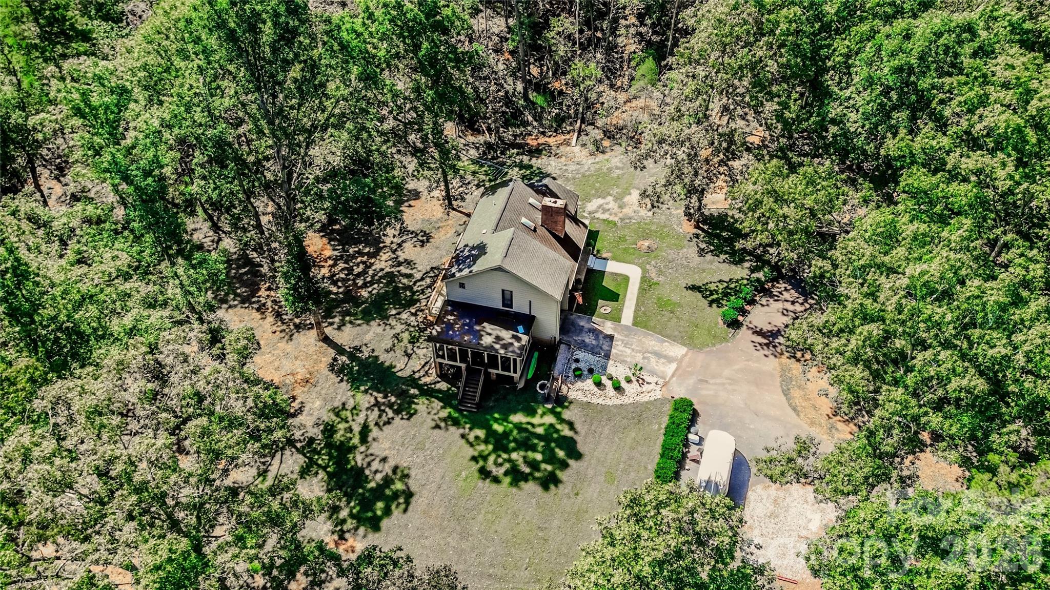 142 Padgett And Burns Road Forest City, NC 28043 - Photo 46 of 48 an aerial view of house with yard and car parked