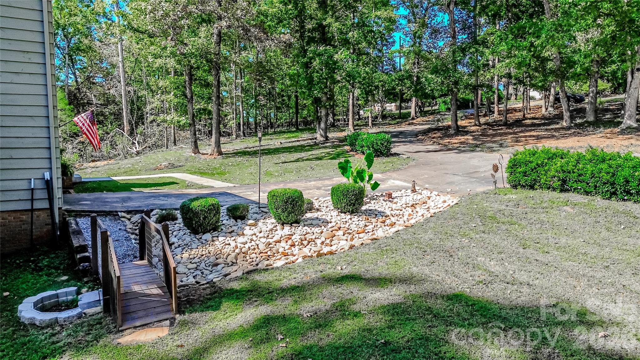 142 Padgett And Burns Road Forest City, NC 28043 - Photo 8 of 48 a view of a park with large trees and plants