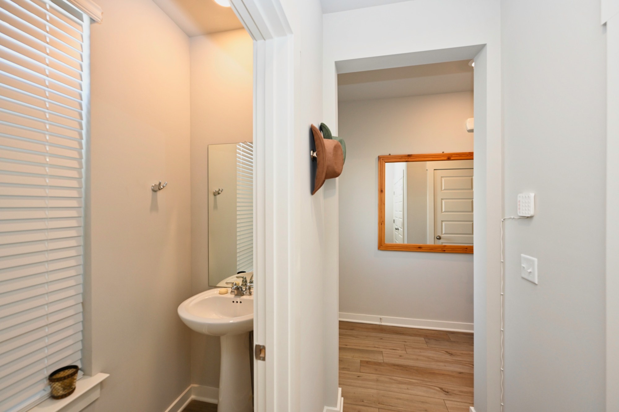 704 Mickelson Way Lebanon, TN 37087 - Photo 6 of 38 a bathroom with a sink and mirror