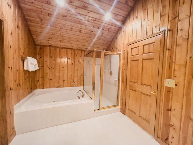 893 Hooper Road Cleveland, GA 30528 - Photo 17 of 68 a bathroom with a tub shower and a sink