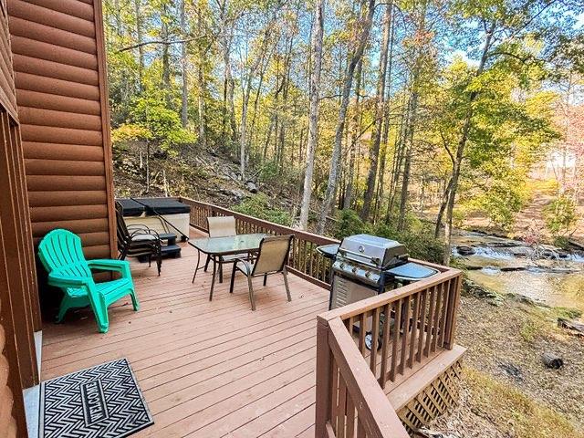 893 Hooper Road Cleveland, GA 30528 - Photo 4 of 68 a view of a chairs and table on the wooden floor